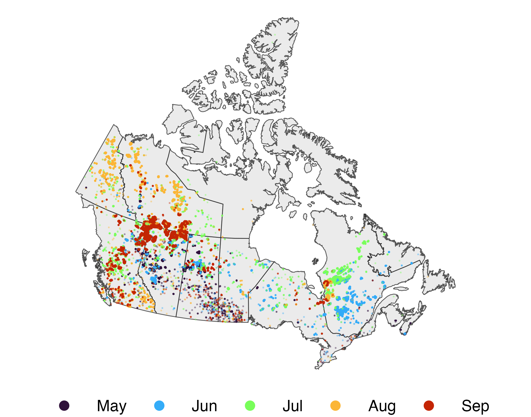 Canadian fire detections from May through September 2023, colored by month; detections cluster across western Canada and parts of Quebec.